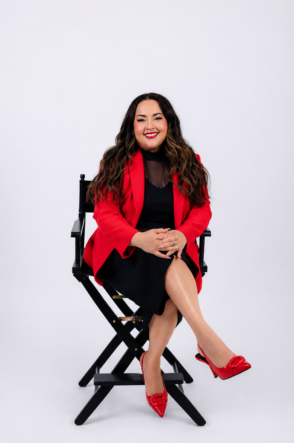 Portrait of Tania Torres seated in a director's chair
